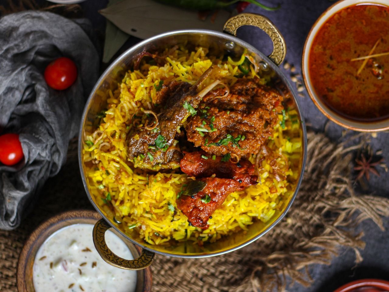 A savory Indian biryani with aromatic spices and rich curry sauce, perfect for a flavorful meal.